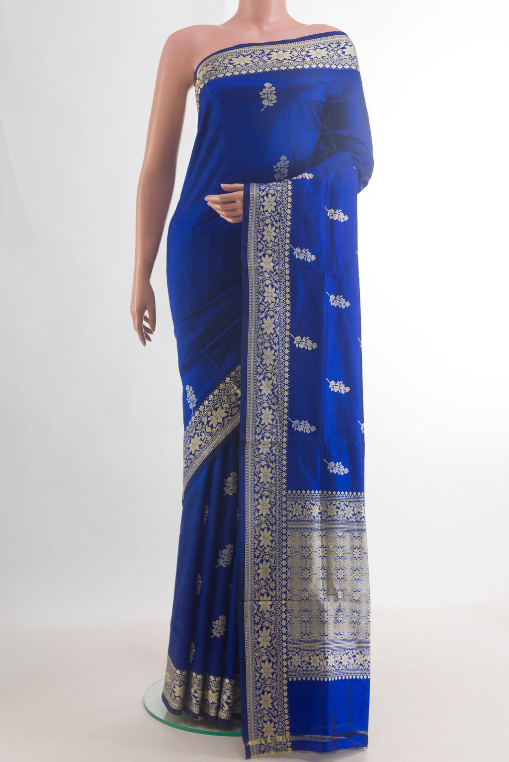 Pure Silk Blue Banarasi Katan Saree with Thread Butta on the body and Thread Border.  displayed on a mannequin