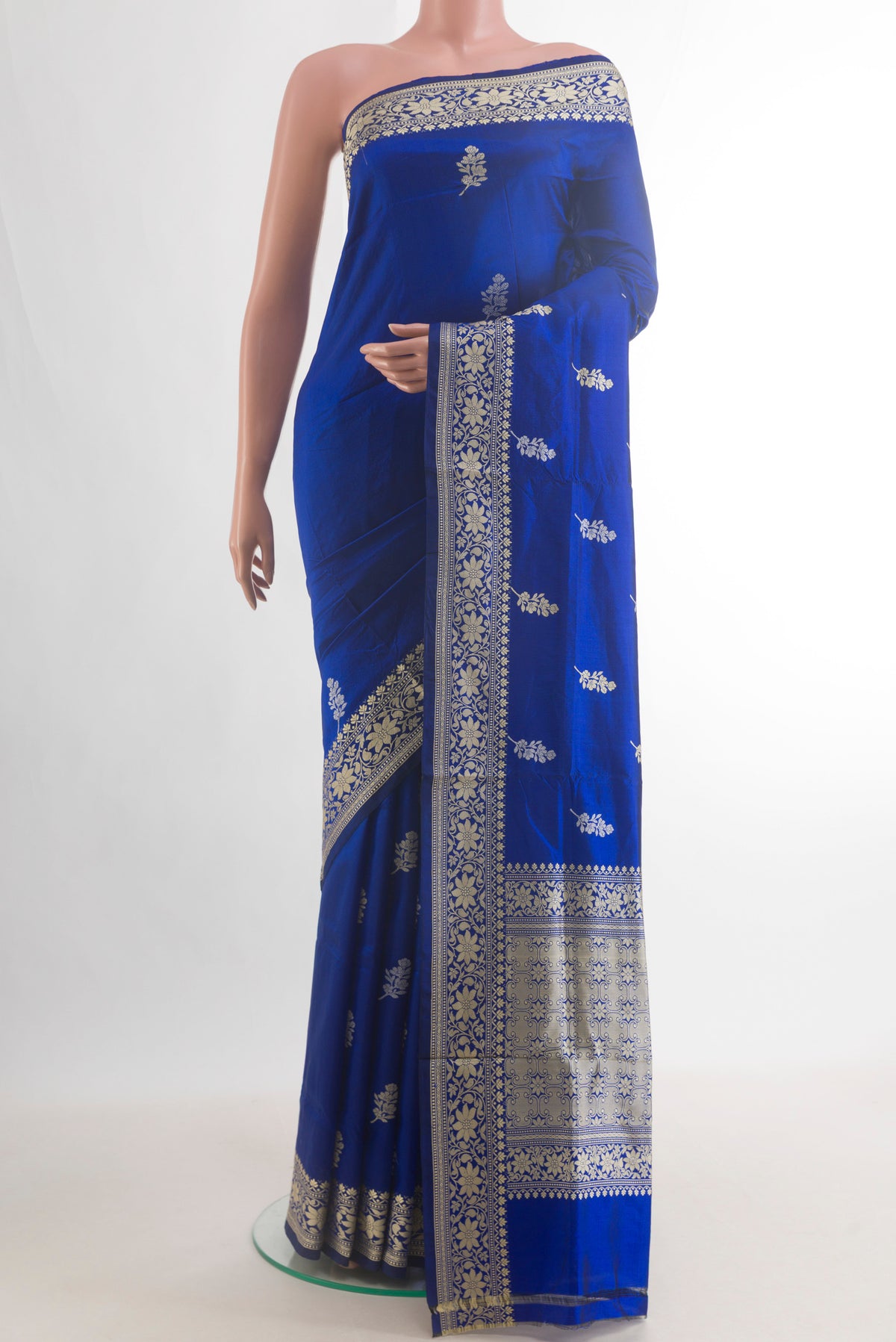 Pure Silk Blue Banarasi Katan Saree with Thread Butta on the body and Thread Border.  displayed on a mannequin