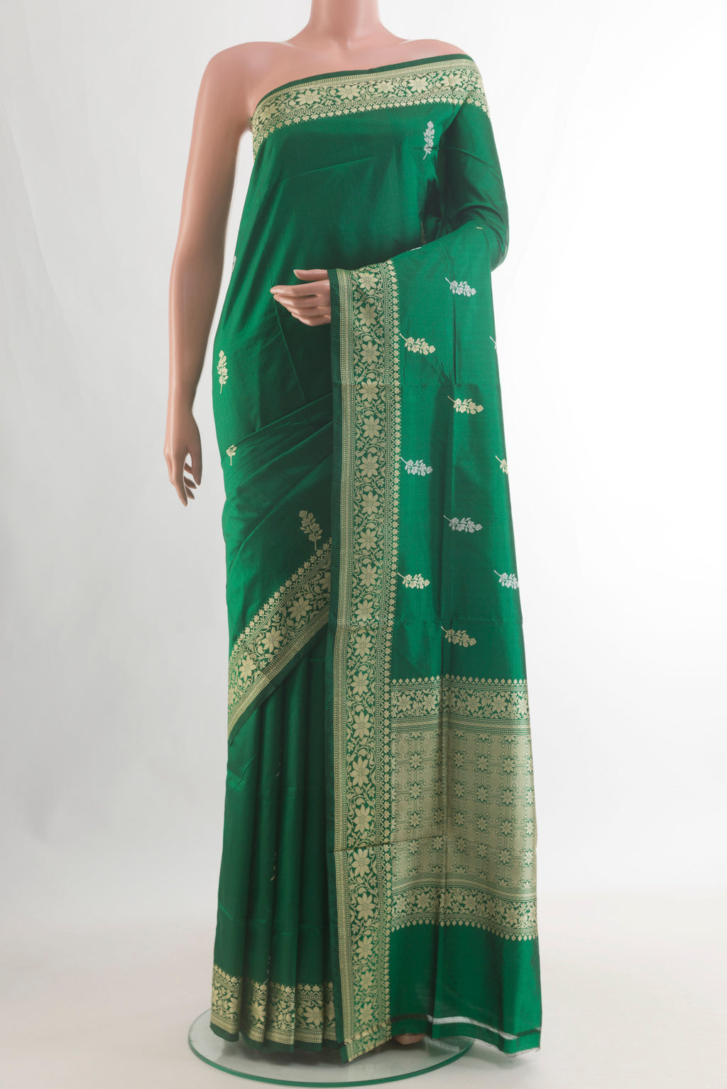 Pure Silk Green Banarasi Katan Saree with Zari Butta on the body and Zari Border.  displayed on a mannequin