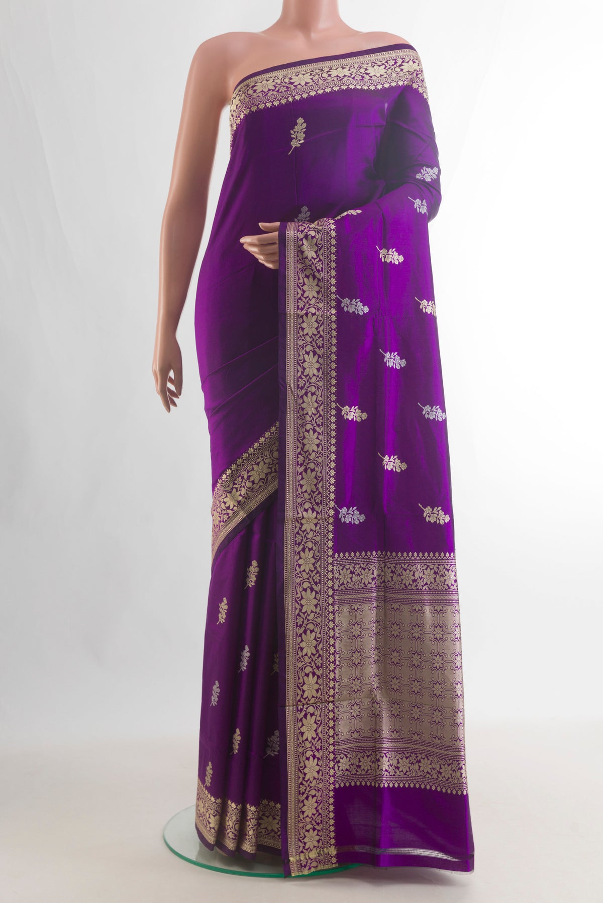 Pure Silk Purple Banarasi Katan Saree with Thread Butta on the body and Thread Border.  displayed on a mannequin