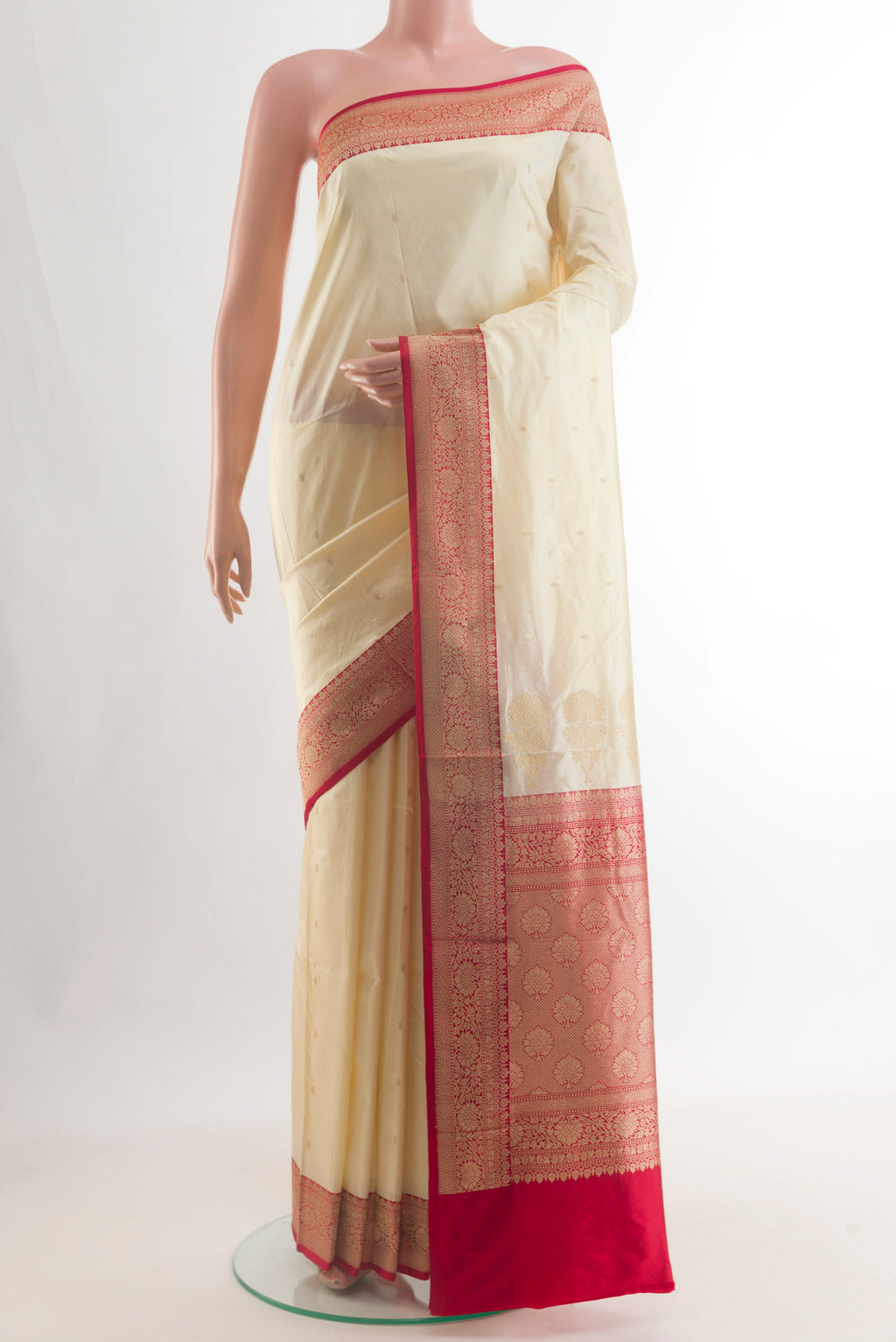 Pure Silk Sandal Banarasi Katan Saree with Zari Butta on the body and Zari Border.  displayed on a mannequin