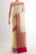 Pure Silk Sandal Banarasi Katan Saree with Zari Butta on the body and Zari Border.  displayed on a mannequin