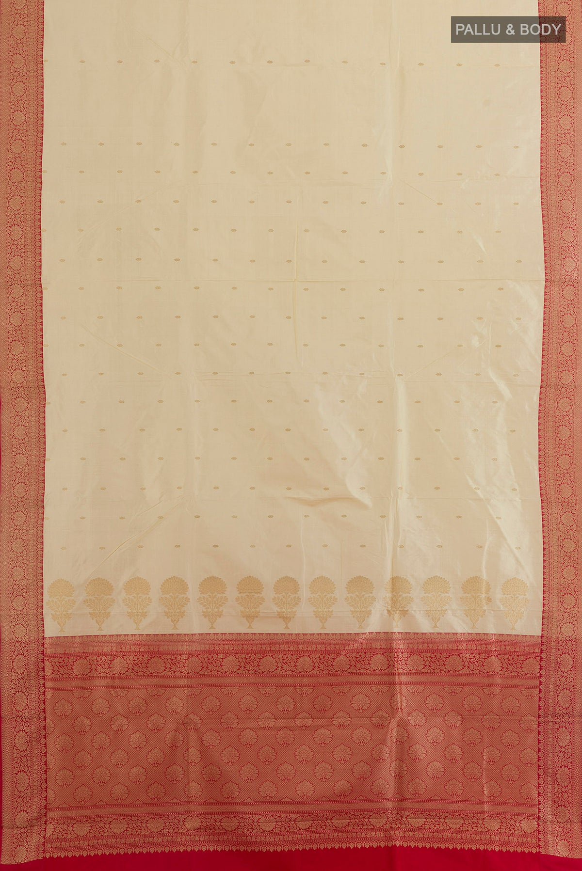 Flat view of Pure Silk Sandal Banarasi Katan Saree with Zari Butta on the body and Zari Border. 