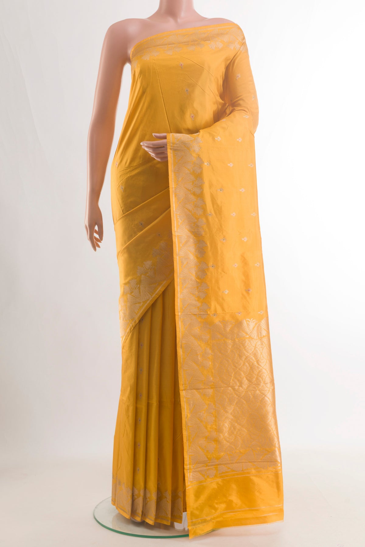 Pure Silk Yellow Banarasi Katan Saree with Zari Butta on the body and Zari Border.  displayed on a mannequin