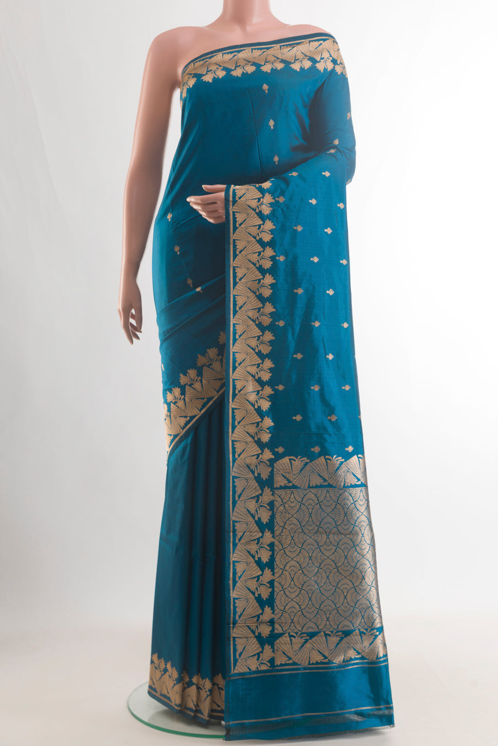 Pure Silk Blue Banarasi Katan Saree with Zari Butta on the body and Zari Border.  displayed on a mannequin