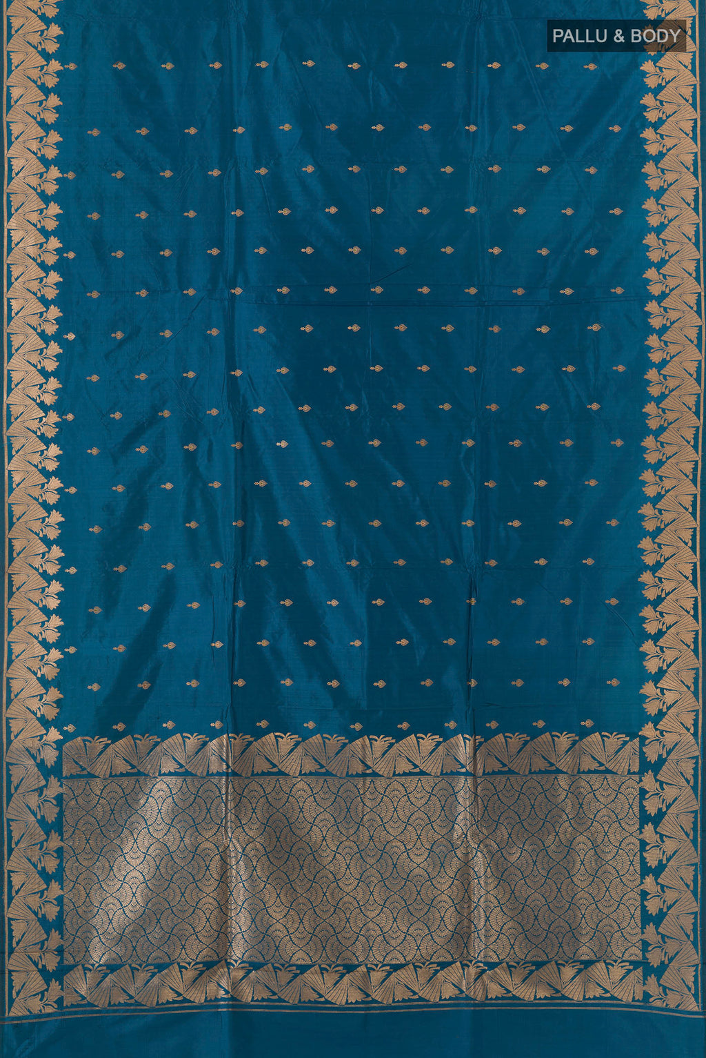 Flat view of Pure Silk Blue Banarasi Katan Saree with Zari Butta on the body and Zari Border. 