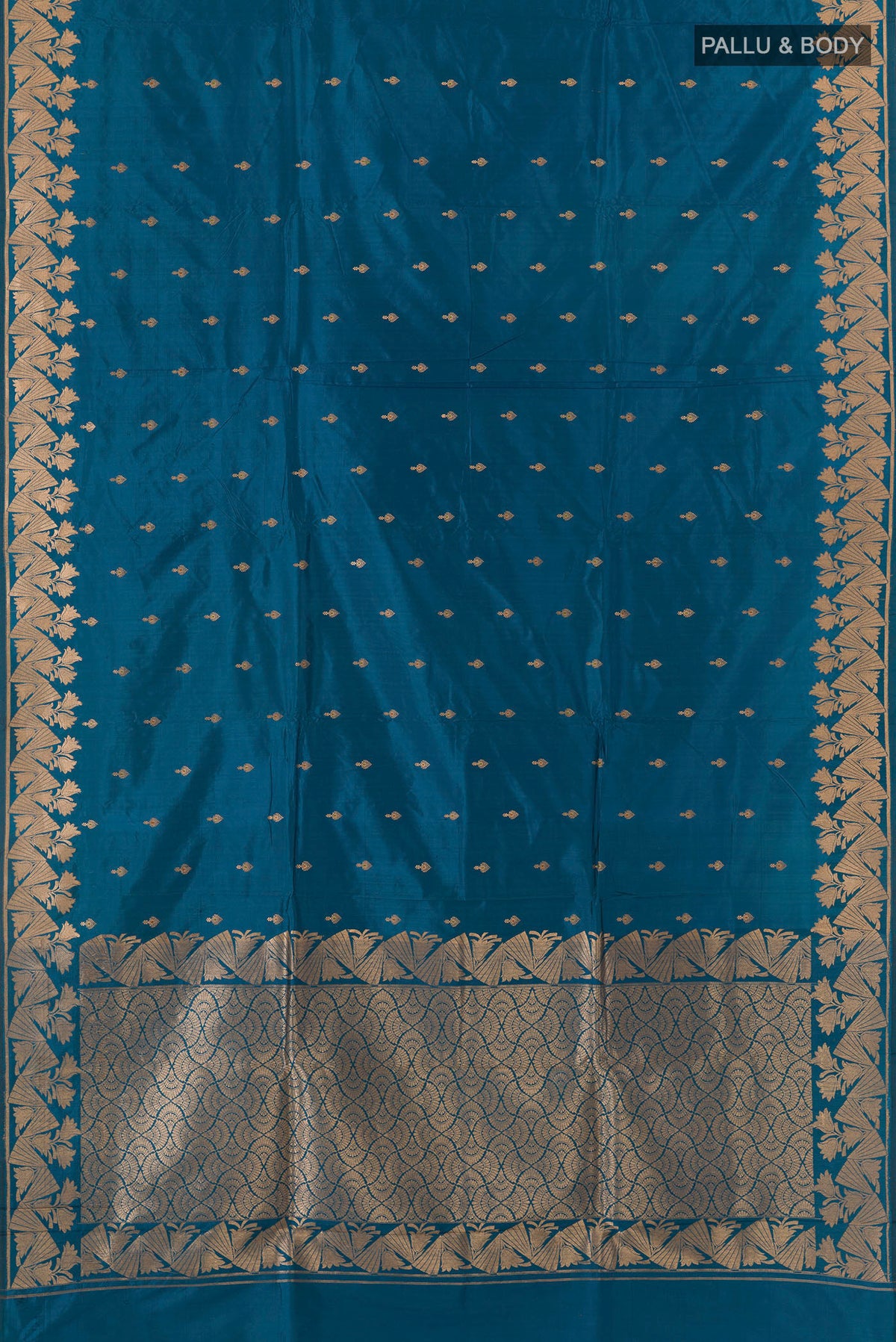 Flat view of Pure Silk Blue Banarasi Katan Saree with Zari Butta on the body and Zari Border. 