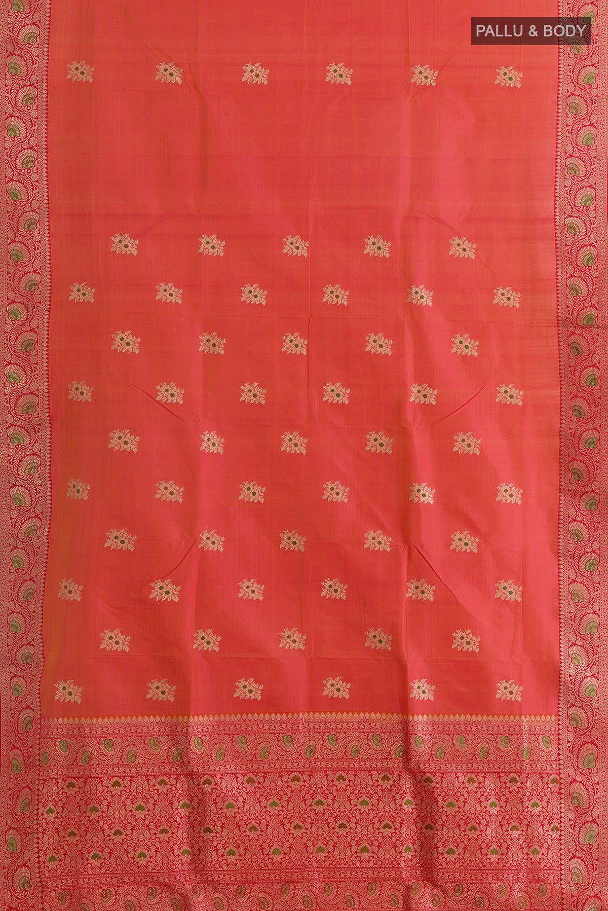 Flat view of Pure Silk Orange Banarasi Katan Saree with Zari Butta on the body and Zari Border. 