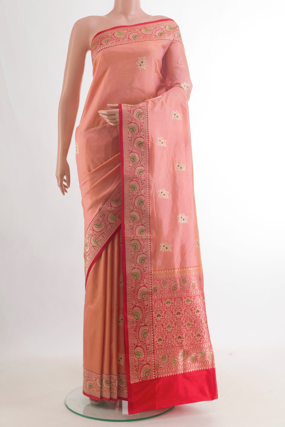 Pure Silk Peach Banarasi Katan Saree with Zari Butta on the body and Zari Border.  displayed on a mannequin