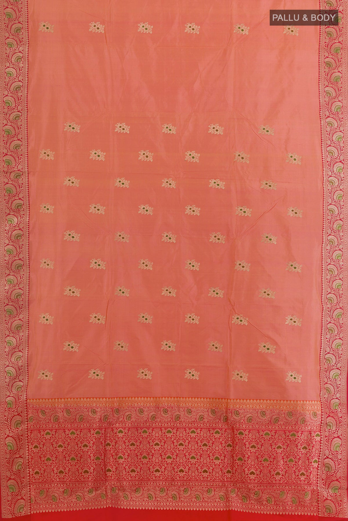 Flat view of Pure Silk Peach Banarasi Katan Saree with Zari Butta on the body and Zari Border. 