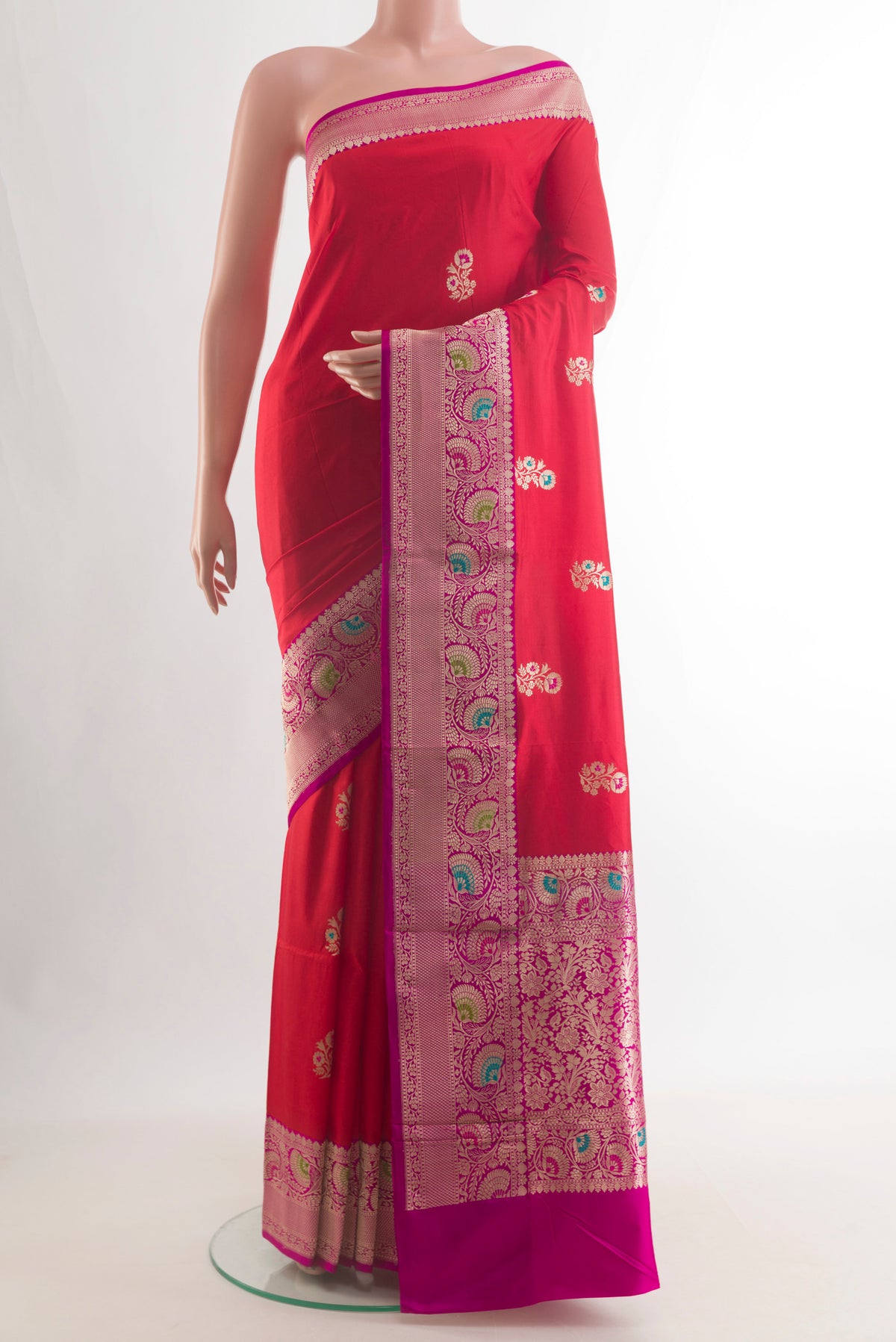 Pure Silk Red Banarasi Katan Saree with Zari Butta on the body and Zari Border.  displayed on a mannequin