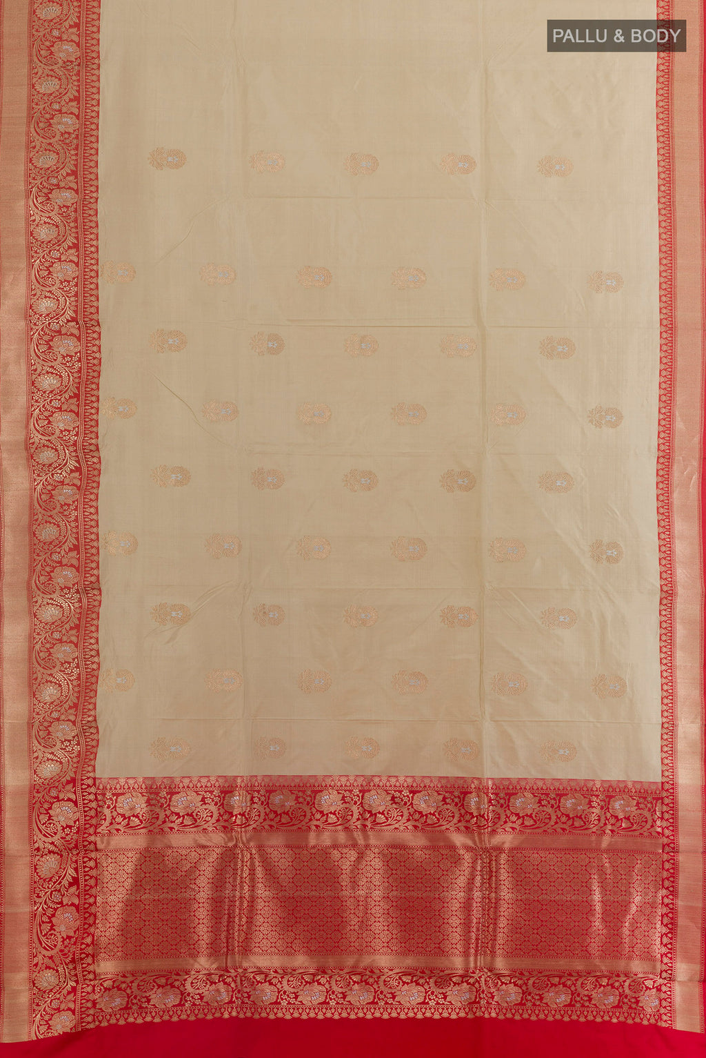 Flat view of Pure Silk Off White Banarasi Katan Saree with Zari Butta on the body and Zari Border. 