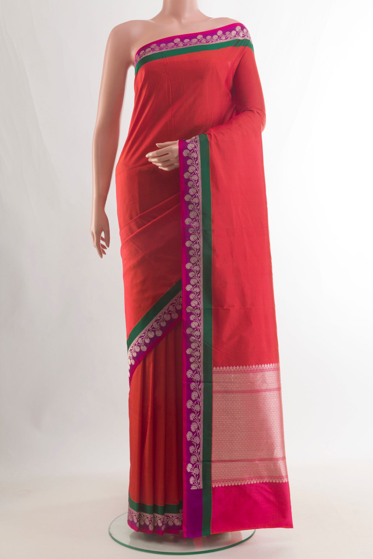 Pure Silk Red Banarasi Katan Saree with Plain Body and Zari Border.  displayed on a mannequin