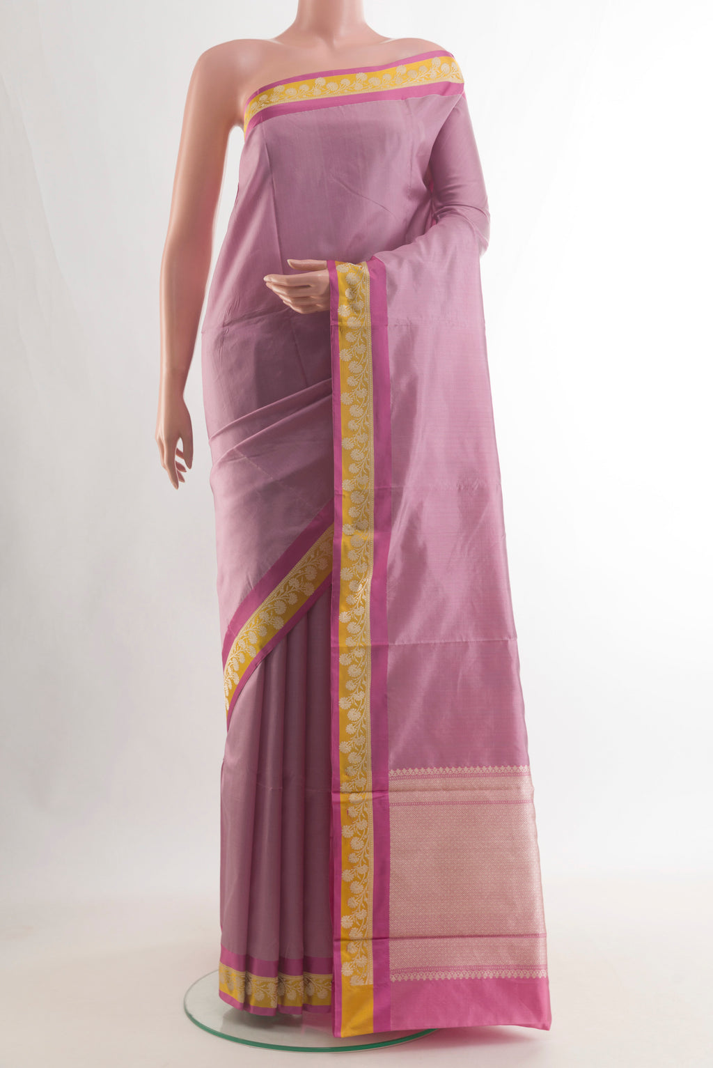 Pure Silk Rose Gold Banarasi Katan Saree with Plain Body and Thread Border.  displayed on a mannequin