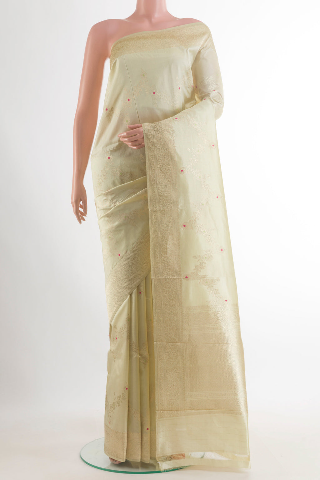 Pure Silk Cream Banarasi Katan Saree with Zari Brocade on the body and Zari Border.  displayed on a mannequin