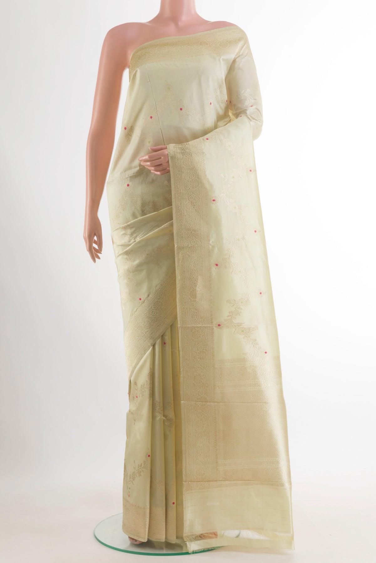 Pure Silk Cream Banarasi Katan Saree with Zari Brocade on the body and Zari Border.  displayed on a mannequin