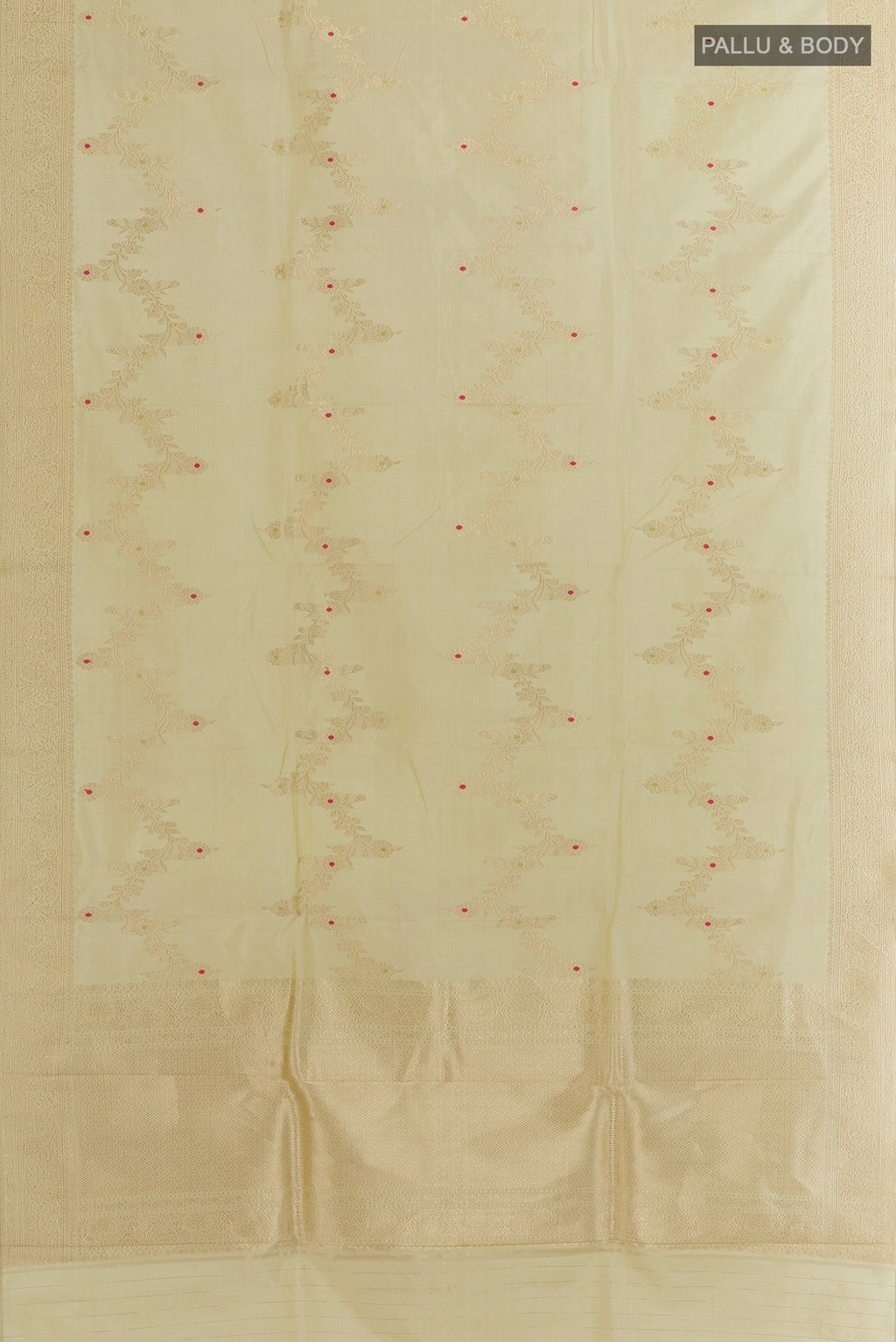 Flat view of Pure Silk Cream Banarasi Katan Saree with Zari Brocade on the body and Zari Border. 