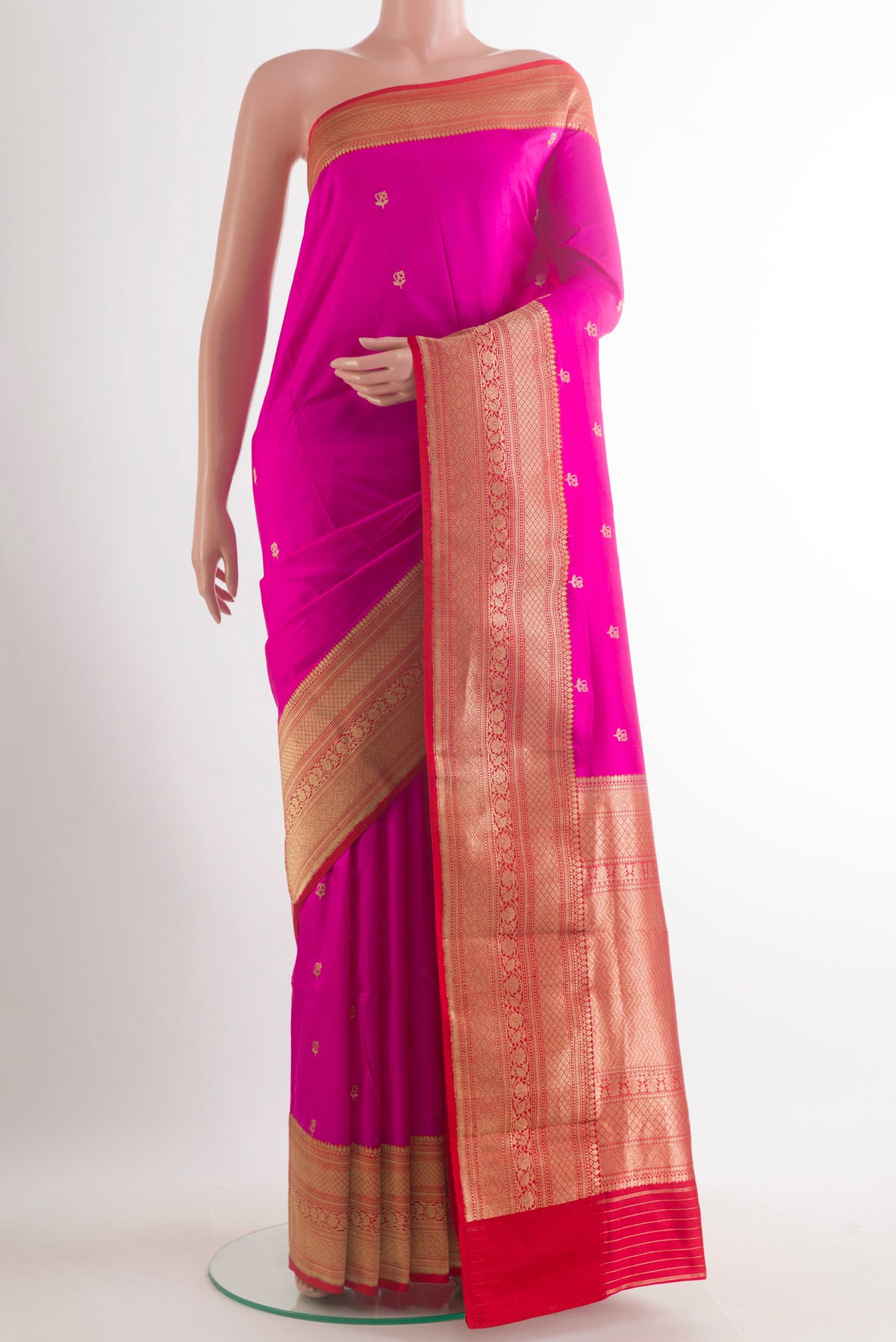 Pure Silk Pink Banarasi Katan Saree with Zari Butta on the body and Zari Border.  displayed on a mannequin