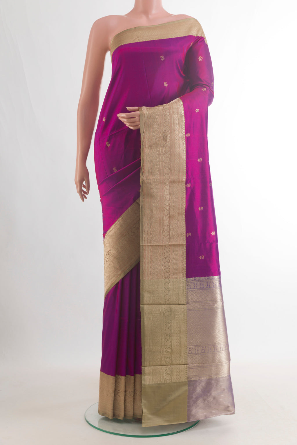 Pure Silk Magenta Banarasi Katan Saree with Zari Butta on the body and Zari Border.  displayed on a mannequin