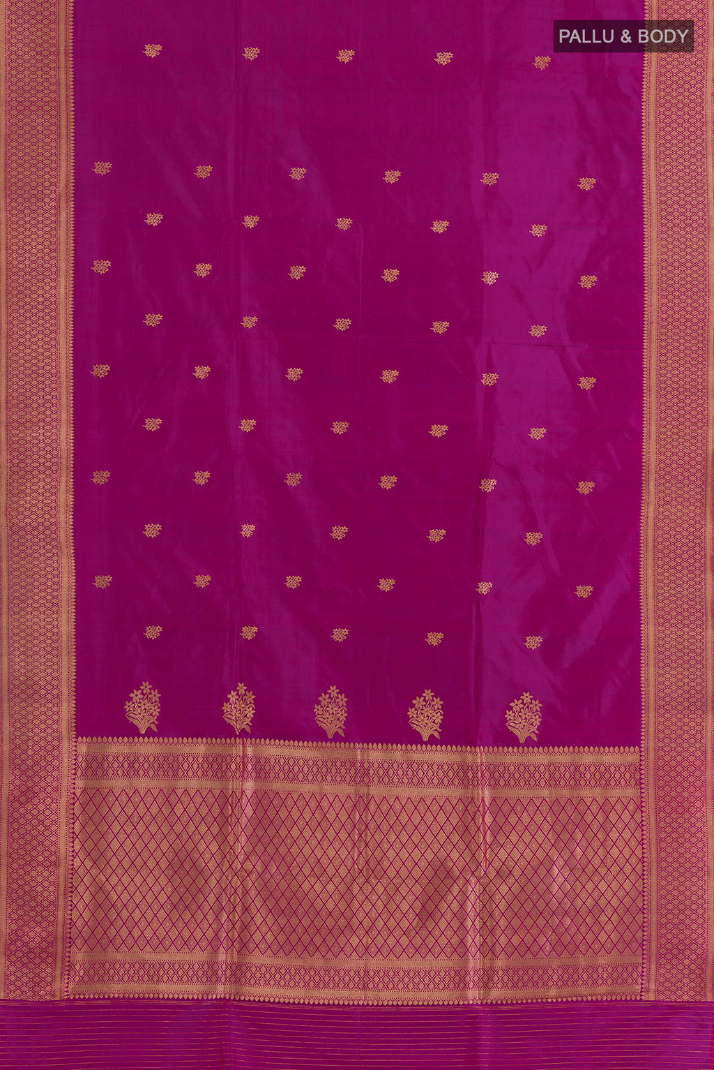 Flat view of Pure Silk Magenta Banarasi Katan Saree with Zari Butta on the body and Zari Border. 