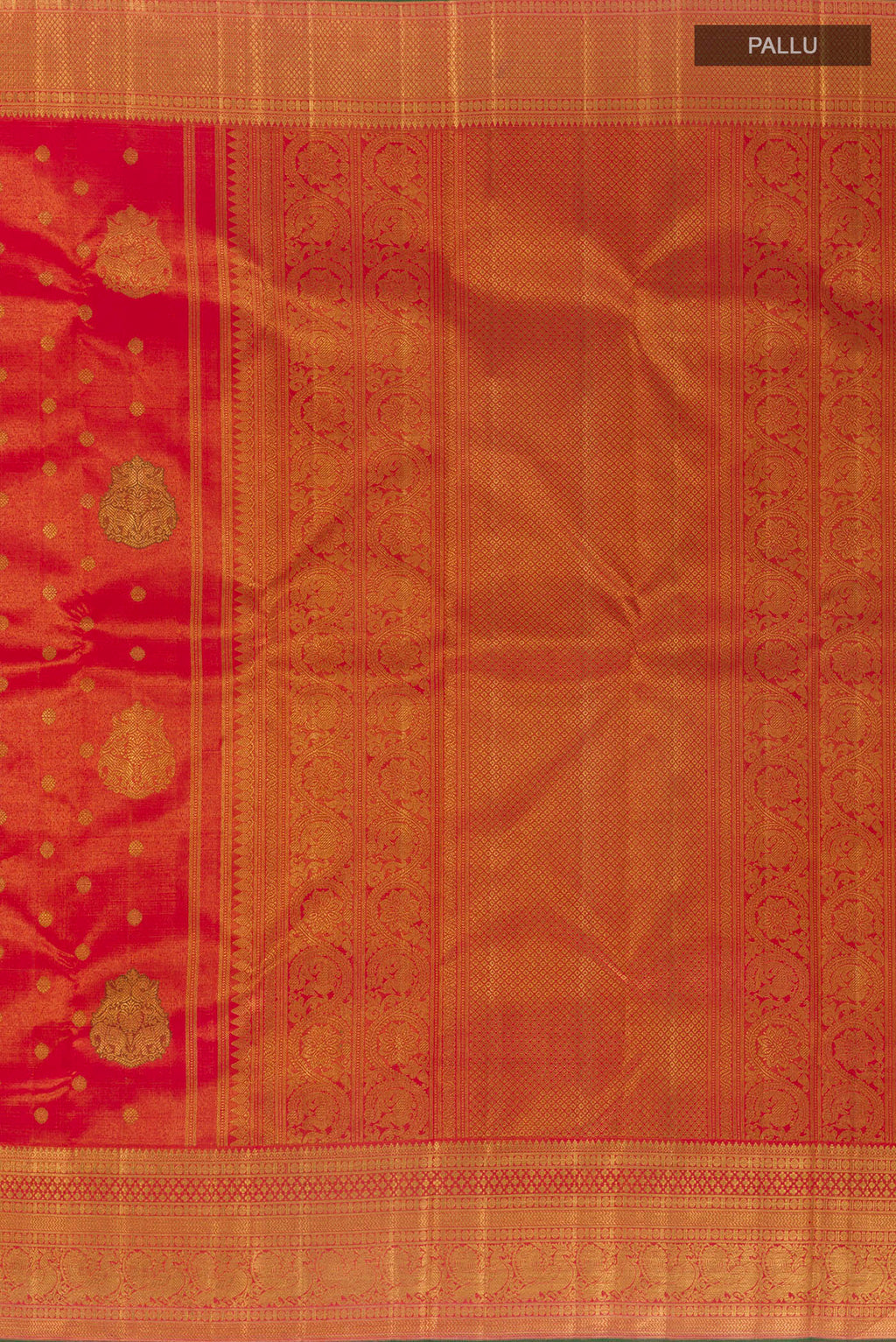 Close up image of the pallu of Pure Silk Pure Zari Red Kanjivaram Tissue Saree with Zari Butta on the body and Zari Border. 