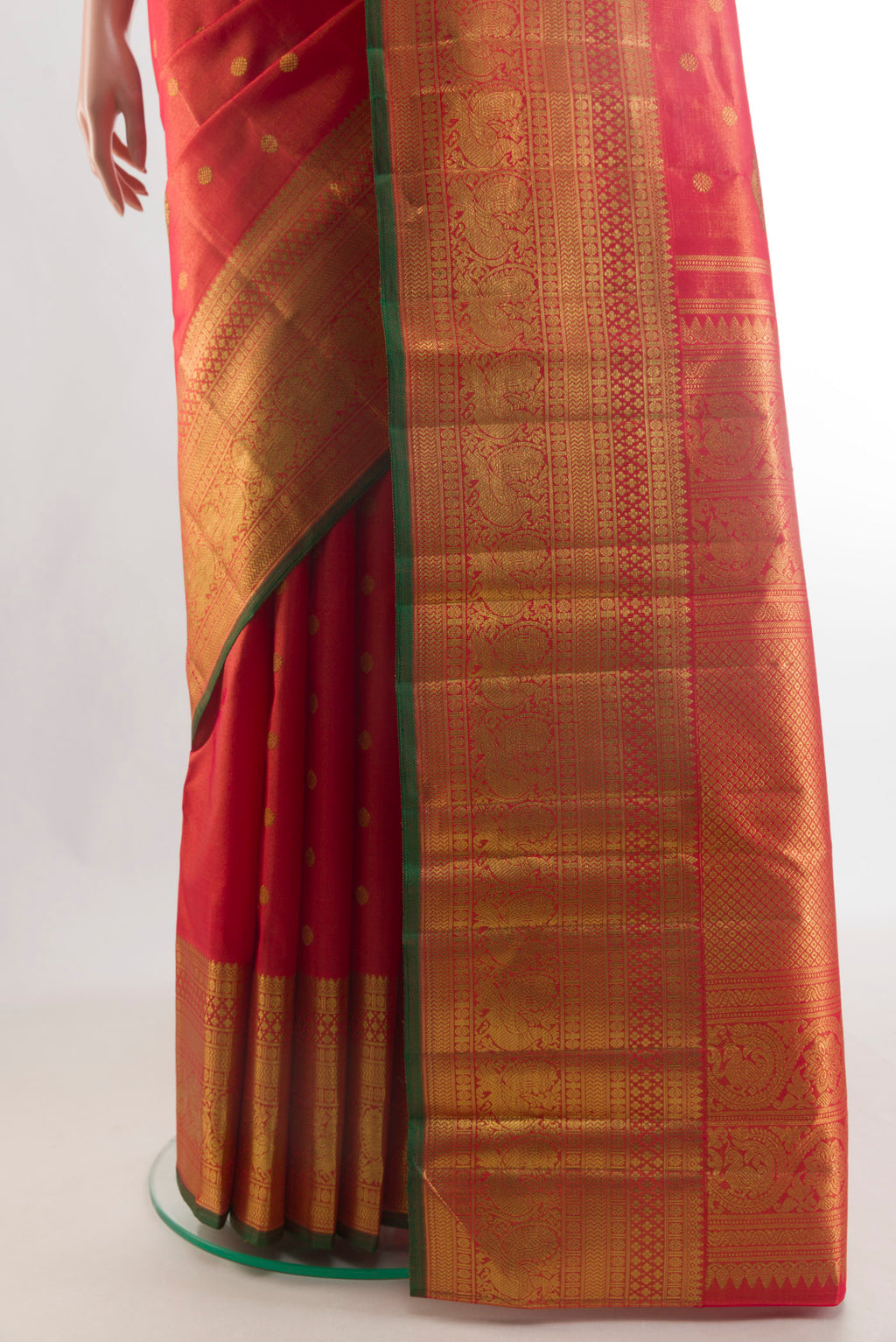 Pleats and pallu of Pure Silk Pure Zari Red Kanjivaram Tissue Saree with Zari Butta on the body and Zari Border. 