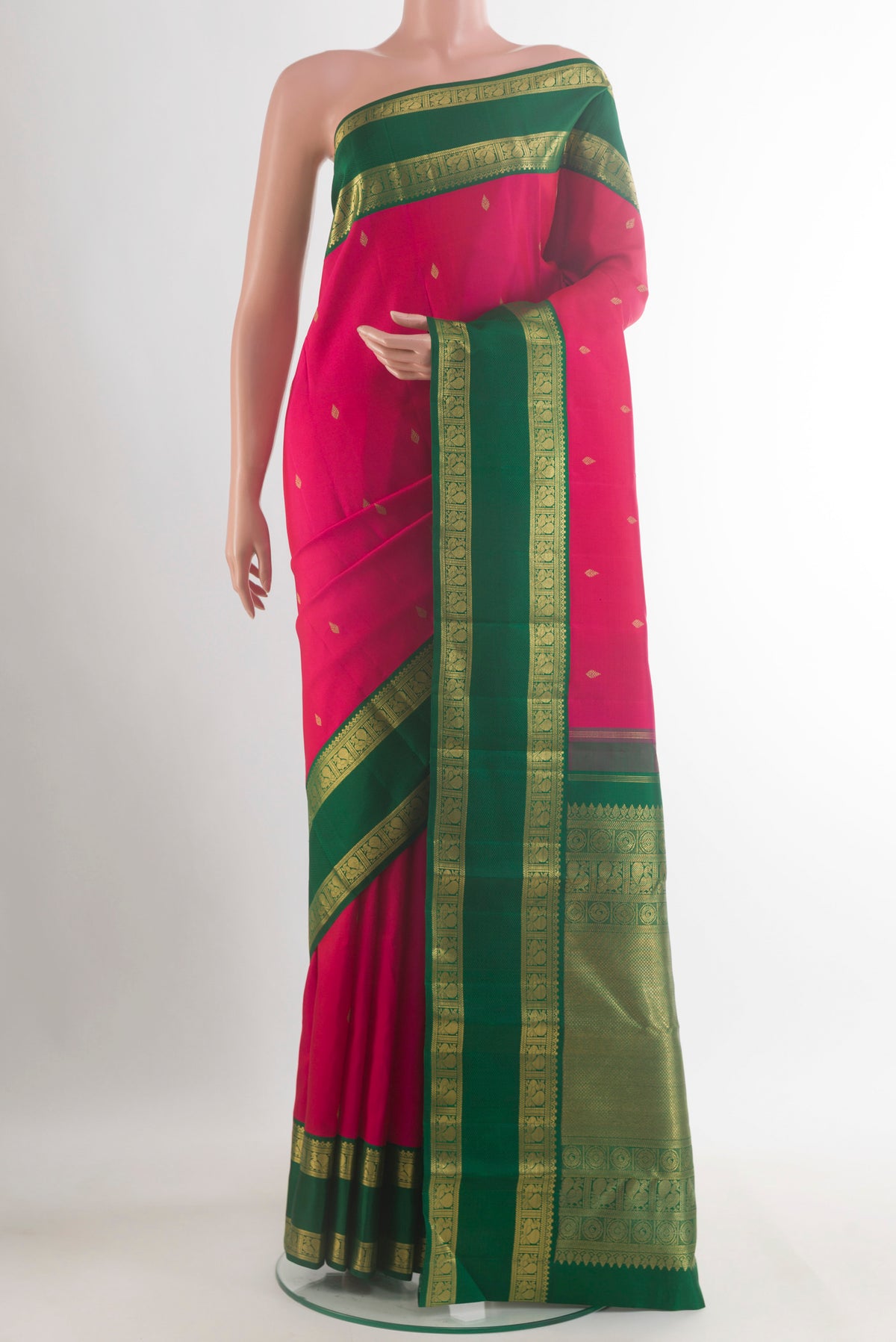 Pure Silk Pure Zari Pink Kanjivaram Saree with Zari Butta on the body and Zari Border.  displayed on a mannequin