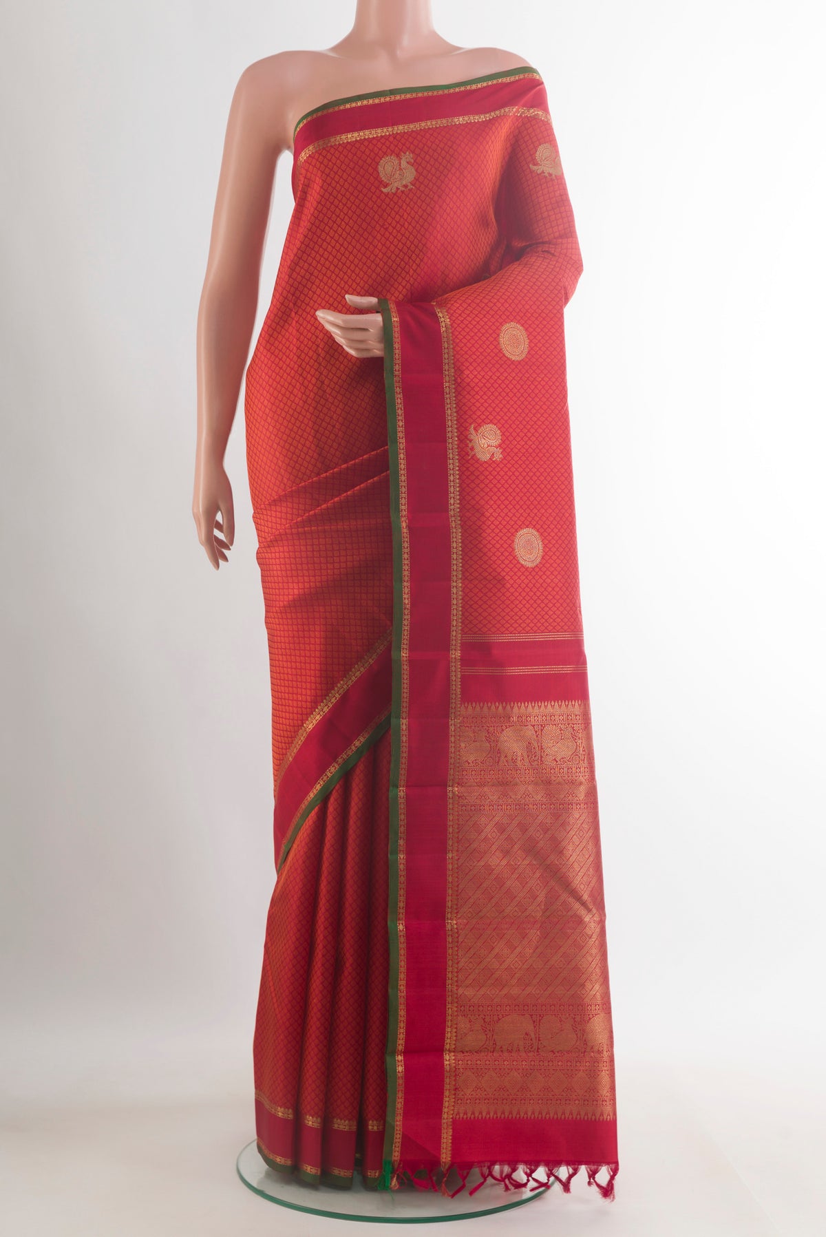 Pure Silk Pure Zari Red Kanjivaram Saree with Jacquard With Zari Butta on the body and Zari Border.  displayed on a mannequin