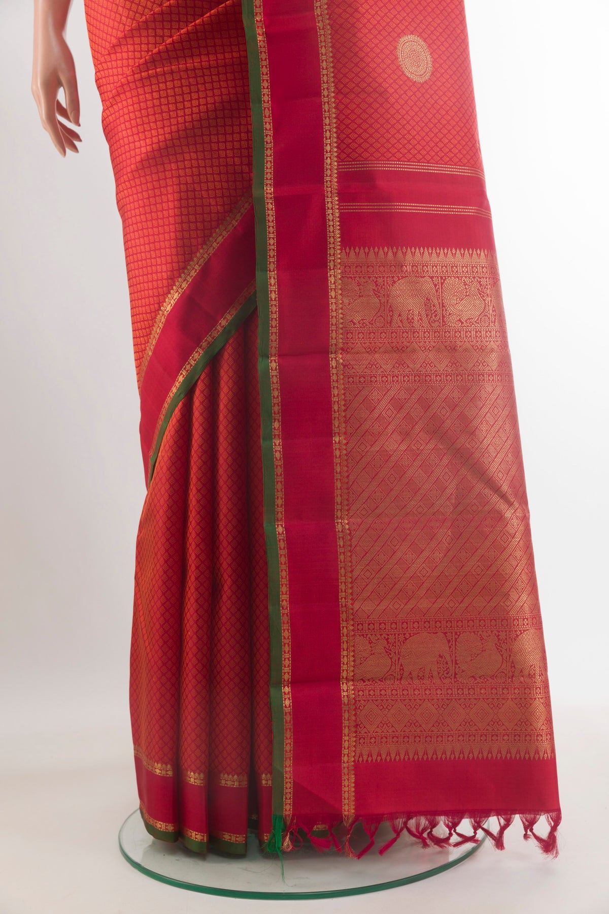 Pleats and pallu of Pure Silk Pure Zari Red Kanjivaram Saree with Jacquard With Zari Butta on the body and Zari Border. 
