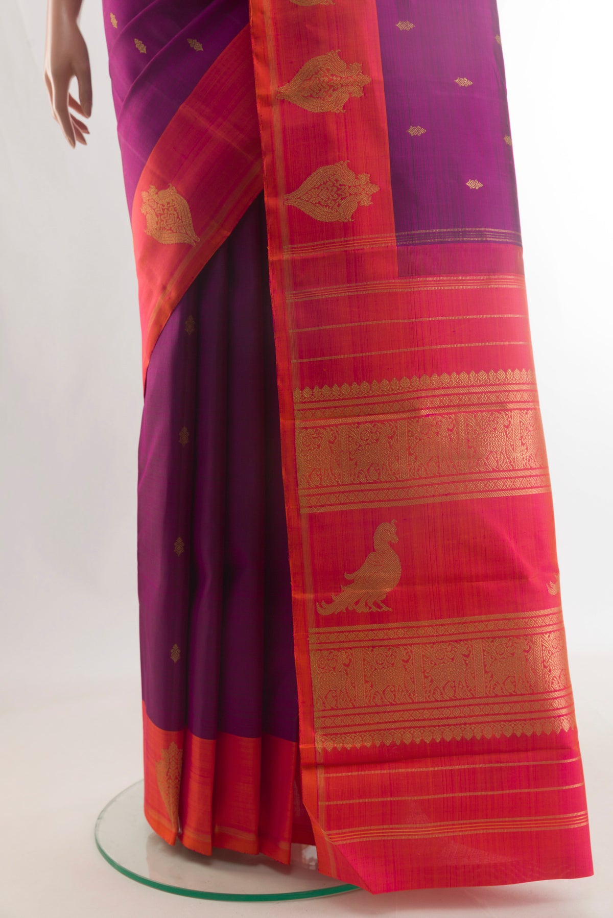 Pleats and pallu of Pure Silk Purple Kanchipuram Saree with Zari Butta on the body and Zari Border. 