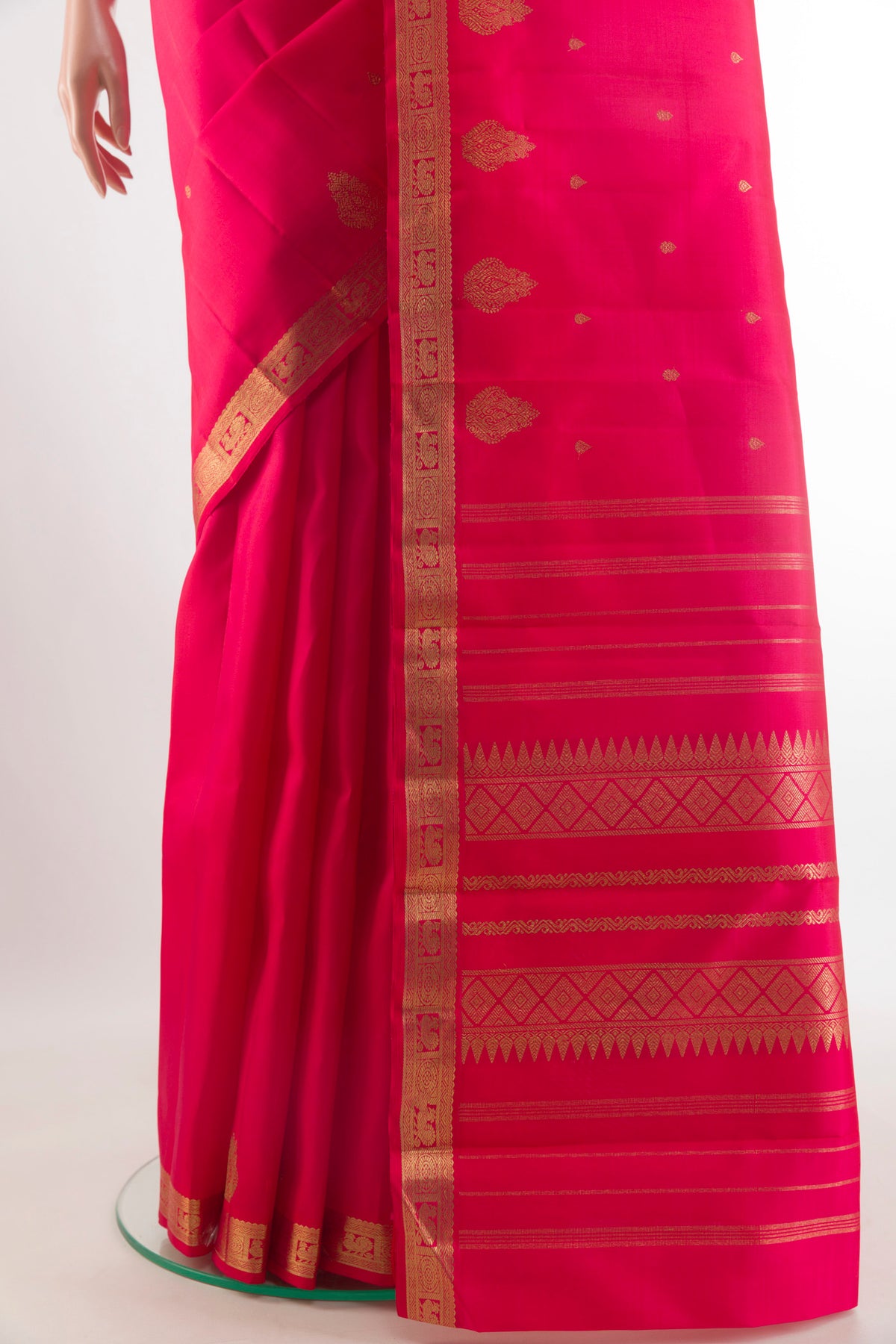 Pleats and pallu of Pure Silk Pure Zari Pink Kanchipuram Saree with Zari Butta on the body and Zari Border. 