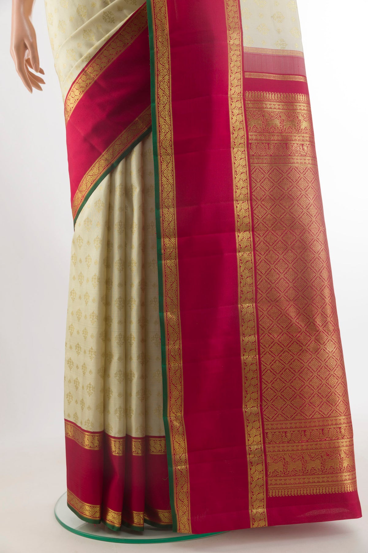Pleats and pallu of Pure Silk Pure Zari Off White Kanjivaram Saree with Zari Brocade on the body and Zari Border. 