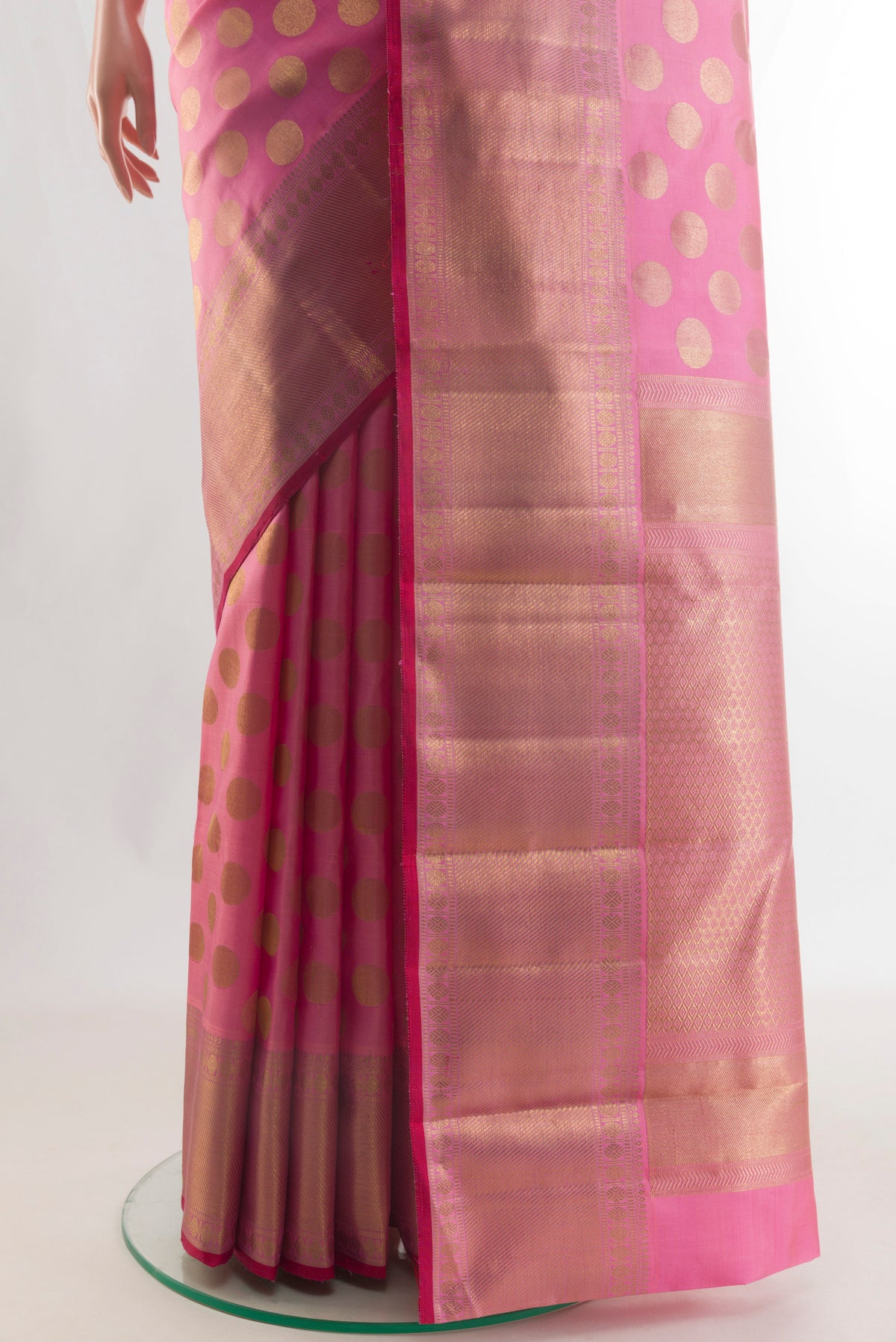 Pleats and pallu of Pure Silk Pink Kanchipuram Saree with Zari Butta on the body and Zari Border. 