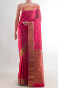 Pure Silk Pure Zari Pink Kanchipuram Saree with Zari Butta on the body and Zari Border.  displayed on a mannequin