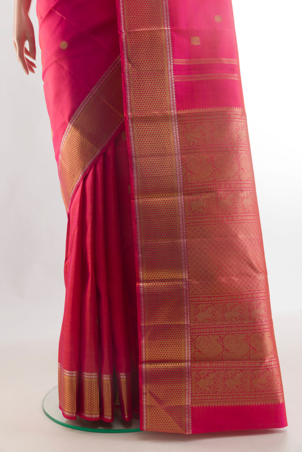 Pleats and pallu of Pure Silk Pure Zari Pink Kanchipuram Saree with Zari Butta on the body and Zari Border. 