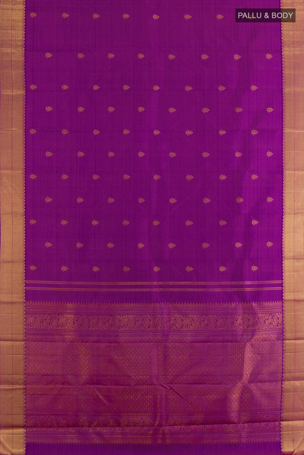 Flat view of Pure Silk Pure Zari Purple Kanjivaram Saree with Zari Butta on the body and Zari Border. 