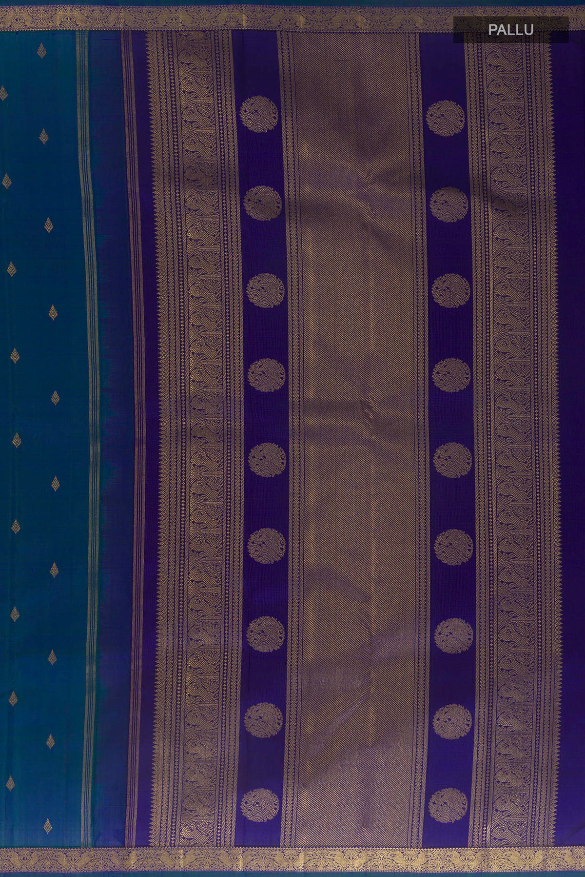 Close up image of the pallu of Pure Silk Pure Zari Peacock Blue Kanchipuram Saree with Zari Butta on the body and Zari Border. 