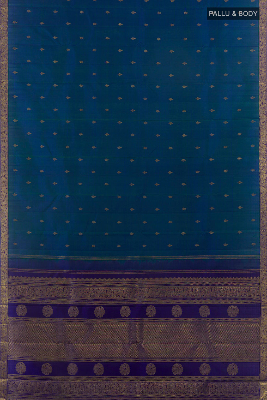 Flat view of Pure Silk Pure Zari Peacock Blue Kanchipuram Saree with Zari Butta on the body and Zari Border. 