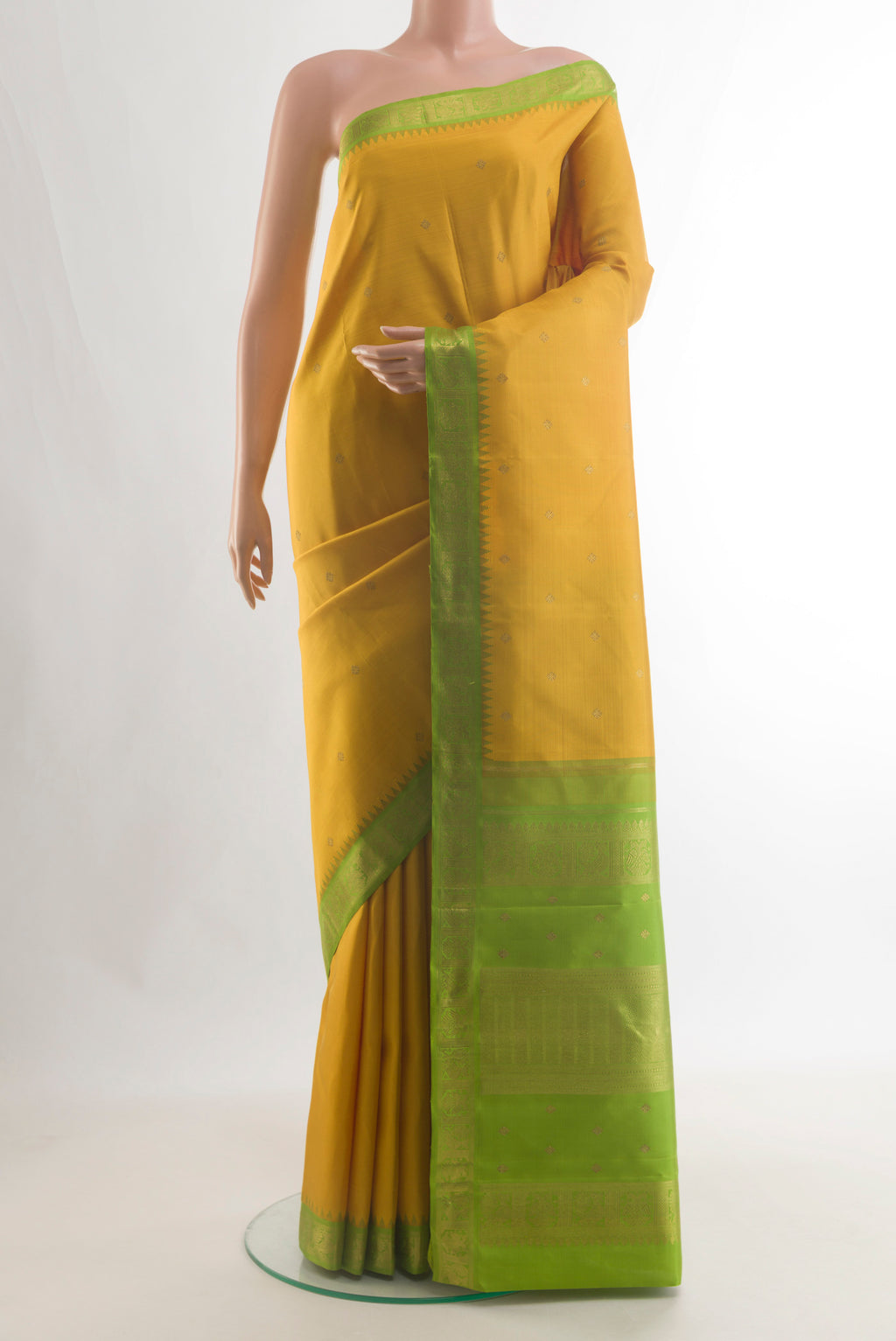 Pure Silk Pure Zari Yellow Kanjivaram Saree with Zari Butta on the body and Zari Border.  displayed on a mannequin