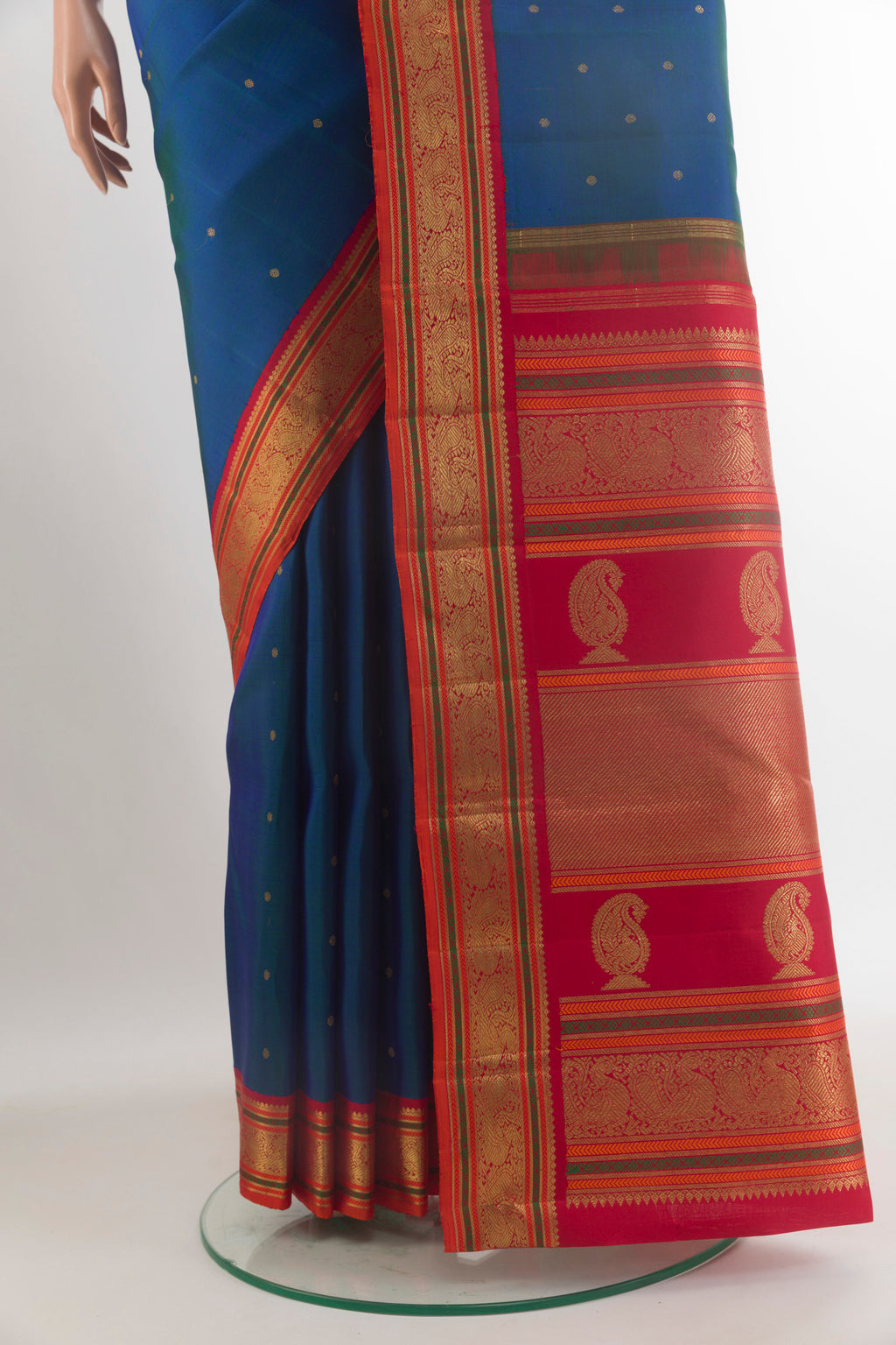 Pleats and pallu of Pure Silk Pure Zari Blue Kanjivaram Saree with Zari Butta on the body and Zari Border. 