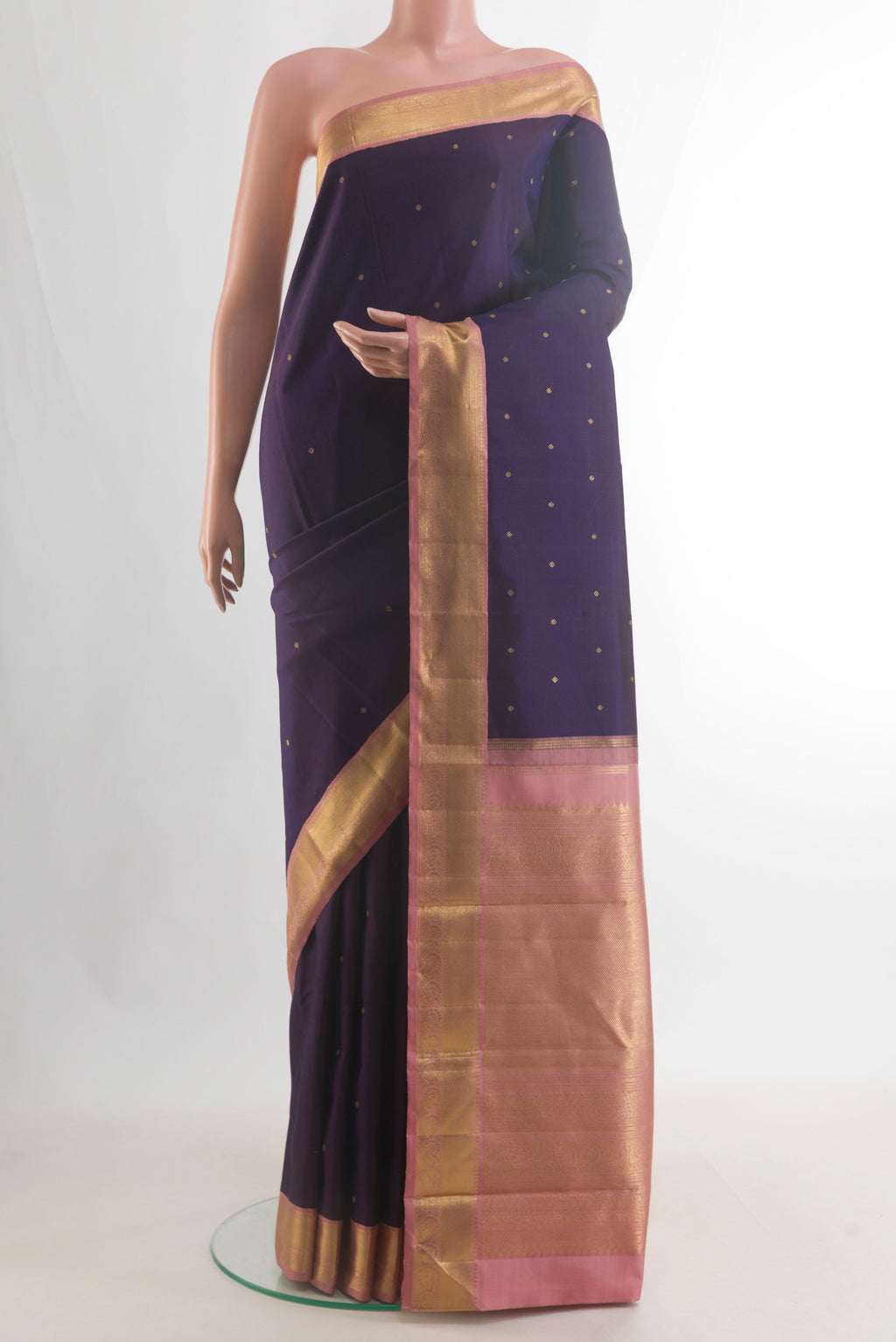 Pure Silk Pure Zari Navy Blue Kanjivaram Saree with Zari Butta on the body and Zari Border.  displayed on a mannequin