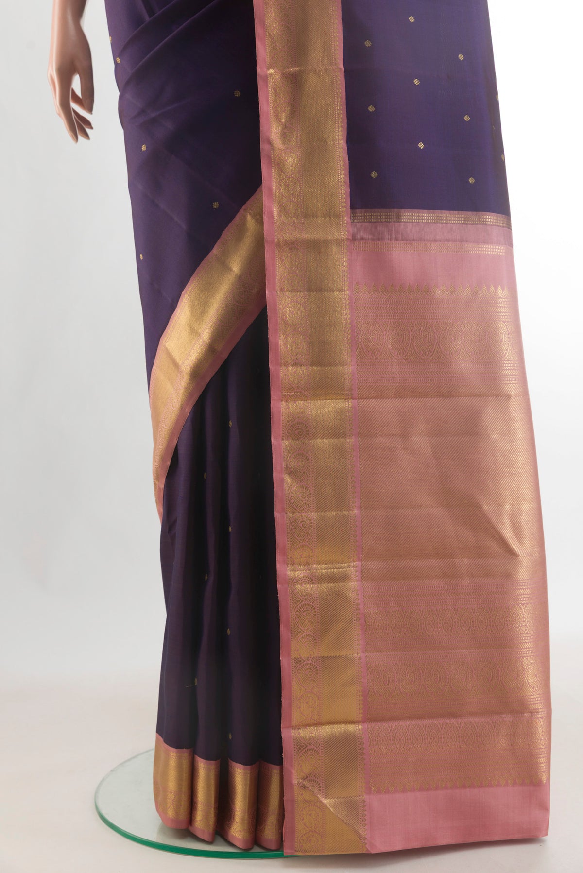 Pleats and pallu of Pure Silk Pure Zari Navy Blue Kanjivaram Saree with Zari Butta on the body and Zari Border. 