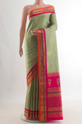 Pure Silk Pure Zari Sage Green Kanjivaram Saree with Zari Butta on the body and Zari Border.  displayed on a mannequin