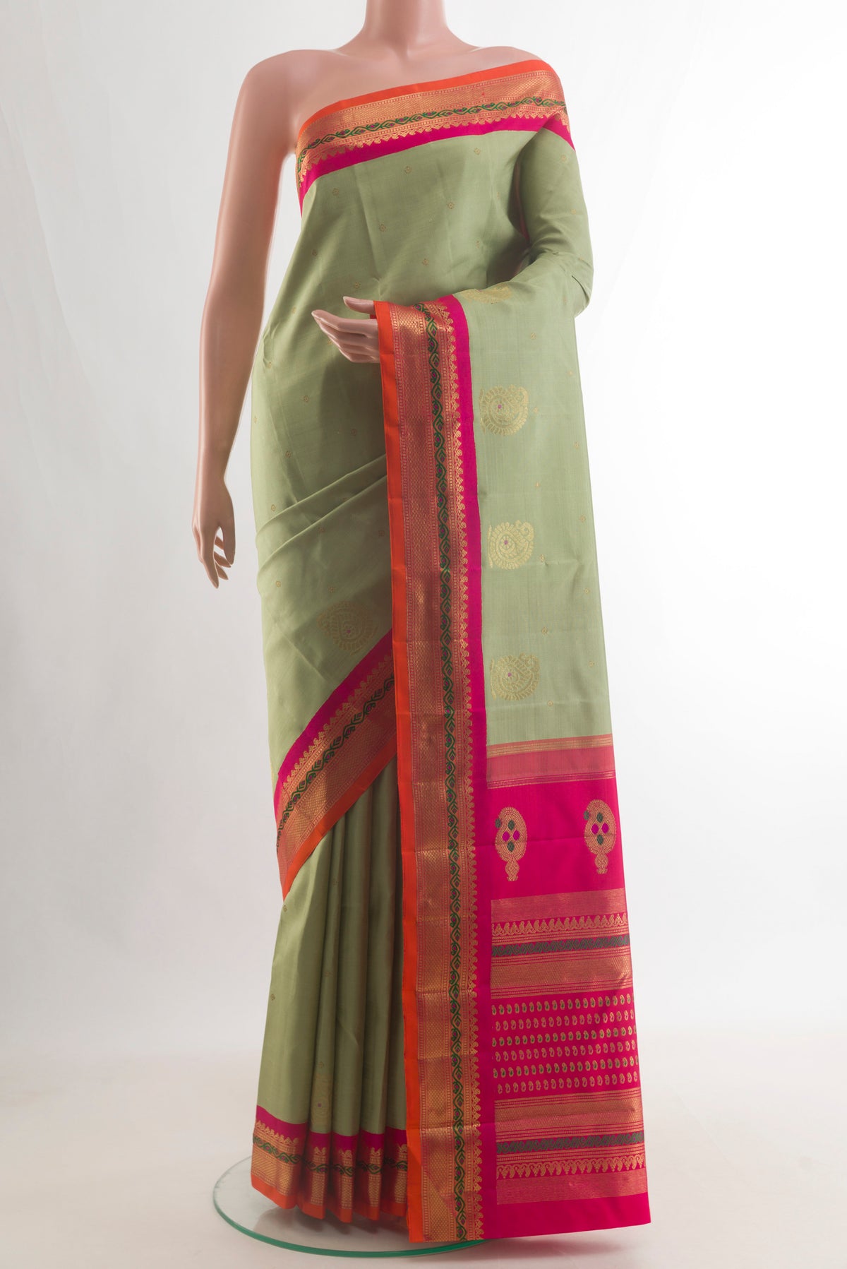 Pure Silk Pure Zari Sage Green Kanjivaram Saree with Zari Butta on the body and Zari Border.  displayed on a mannequin