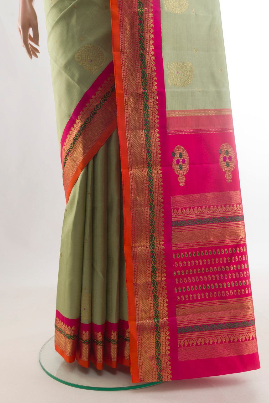 Pleats and pallu of Pure Silk Pure Zari Sage Green Kanjivaram Saree with Zari Butta on the body and Zari Border. 