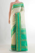 Pure Silk Pure Zari Off White Kanjivaram Saree with Zari Butta on the body and Zari Border.  displayed on a mannequin