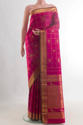 Pure Silk Pure Zari Dark Pink Kanjivaram Saree with Checked design on the body and Zari Border.  displayed on a mannequin