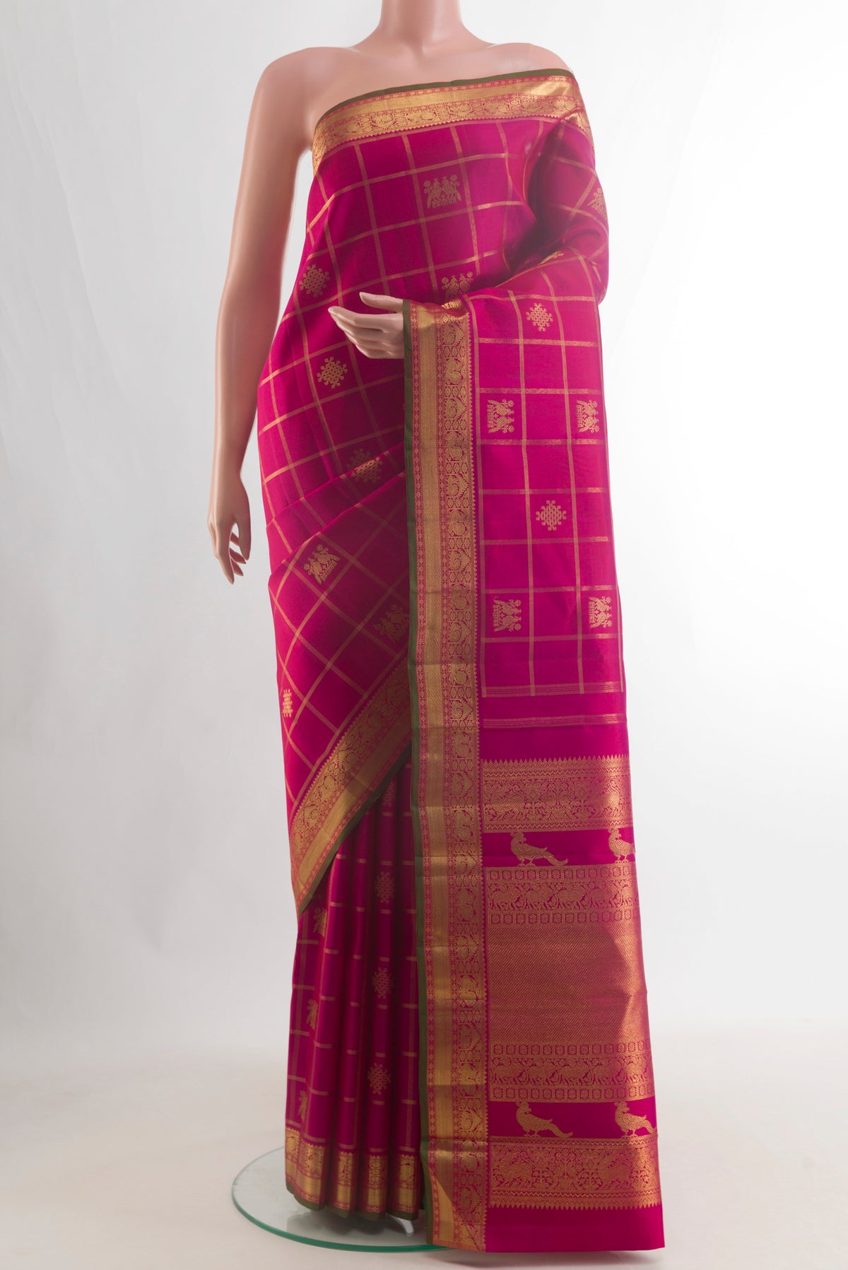 Pure Silk Pure Zari Dark Pink Kanjivaram Saree with Checked design on the body and Zari Border.  displayed on a mannequin