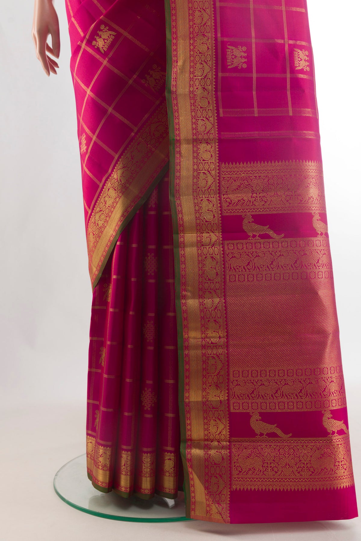 Pleats and pallu of Pure Silk Pure Zari Dark Pink Kanjivaram Saree with Checked design on the body and Zari Border. 