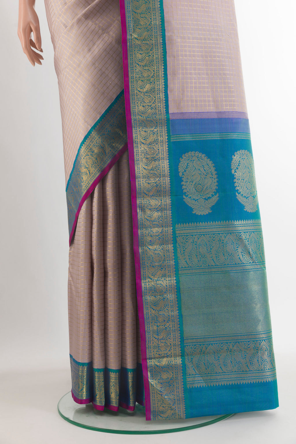Pleats and pallu of Pure Silk Pure Zari Beige Kanjivaram Saree with Checked design on the body and Zari Border. 